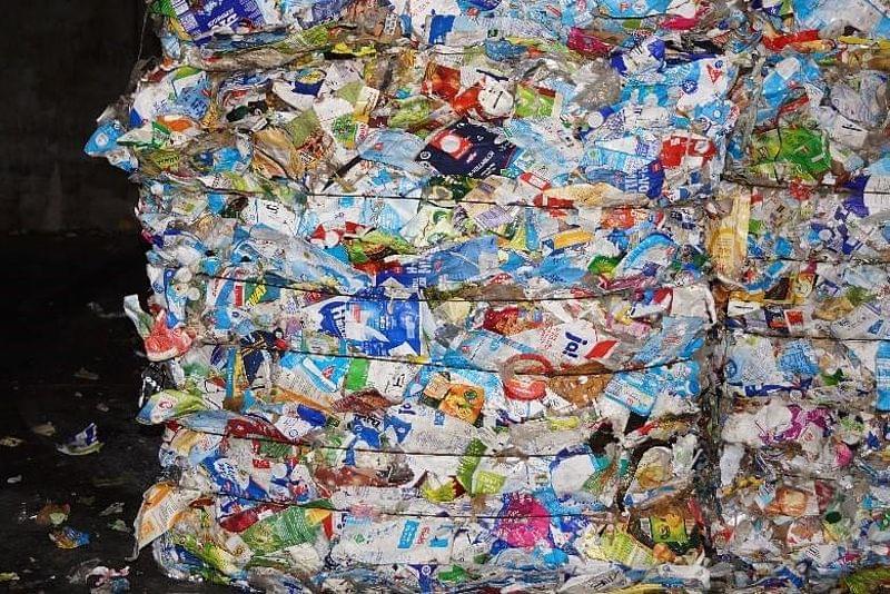 Sorted flat cardboard pressed into bales