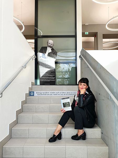 Dr Marie-Luis Zahradnik on the stairs in House 20