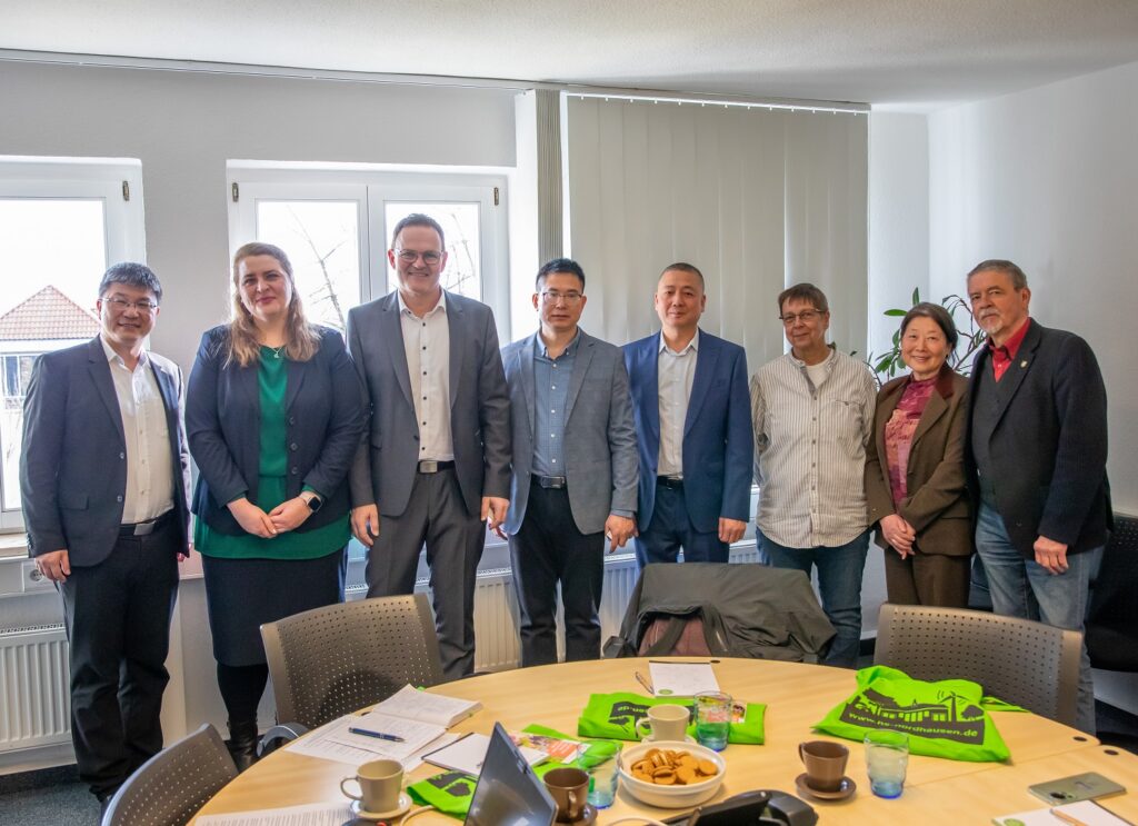 a group of people standing together in a room