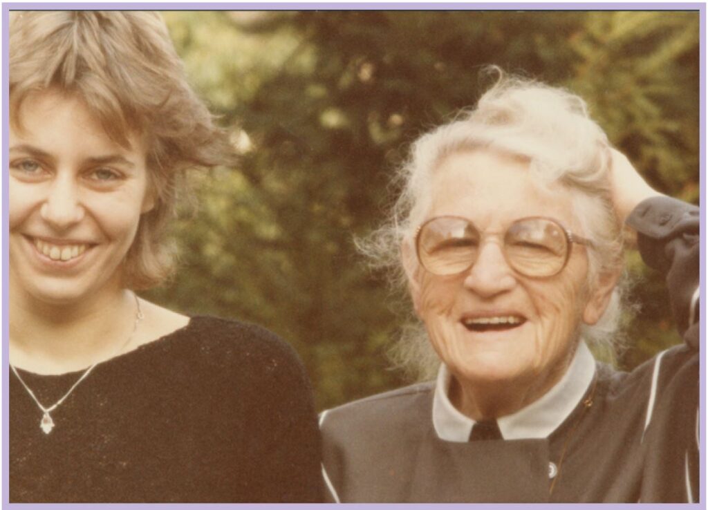 a woman and a woman smiling