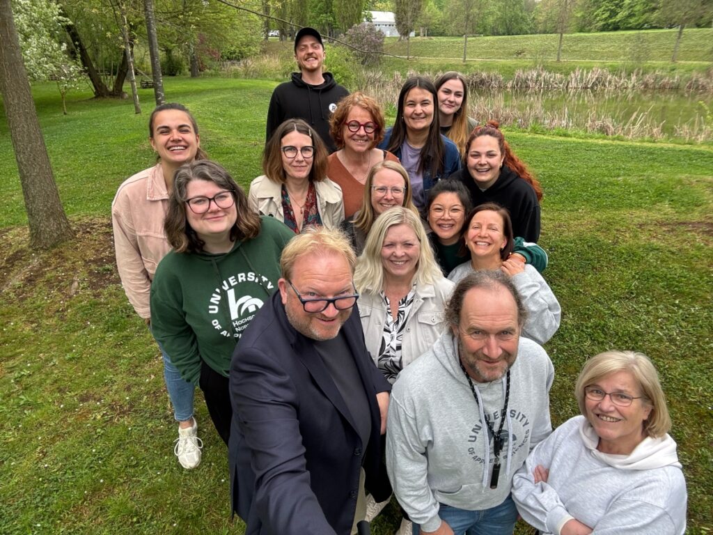 a group of people posing for a photo