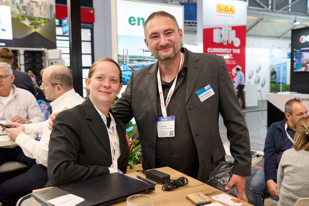 a man and woman posing for a picture