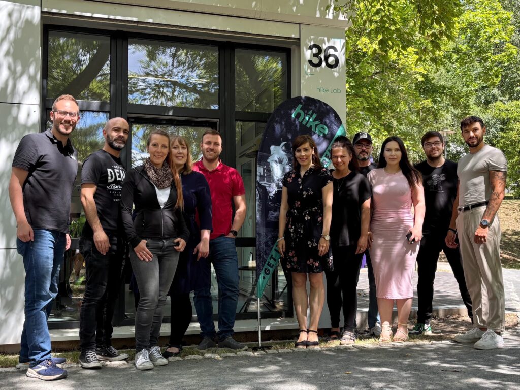 a group of people standing in front of a building