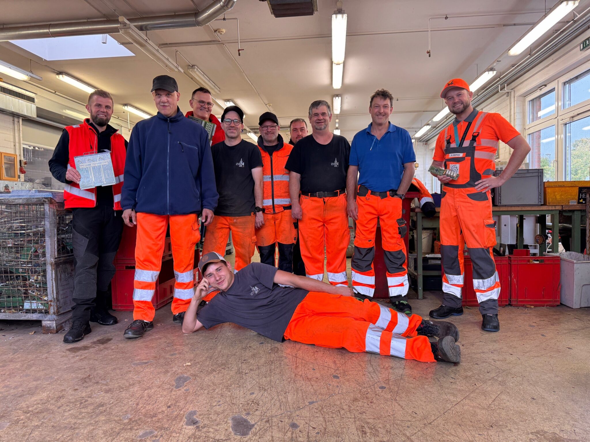 Group of workers in orange