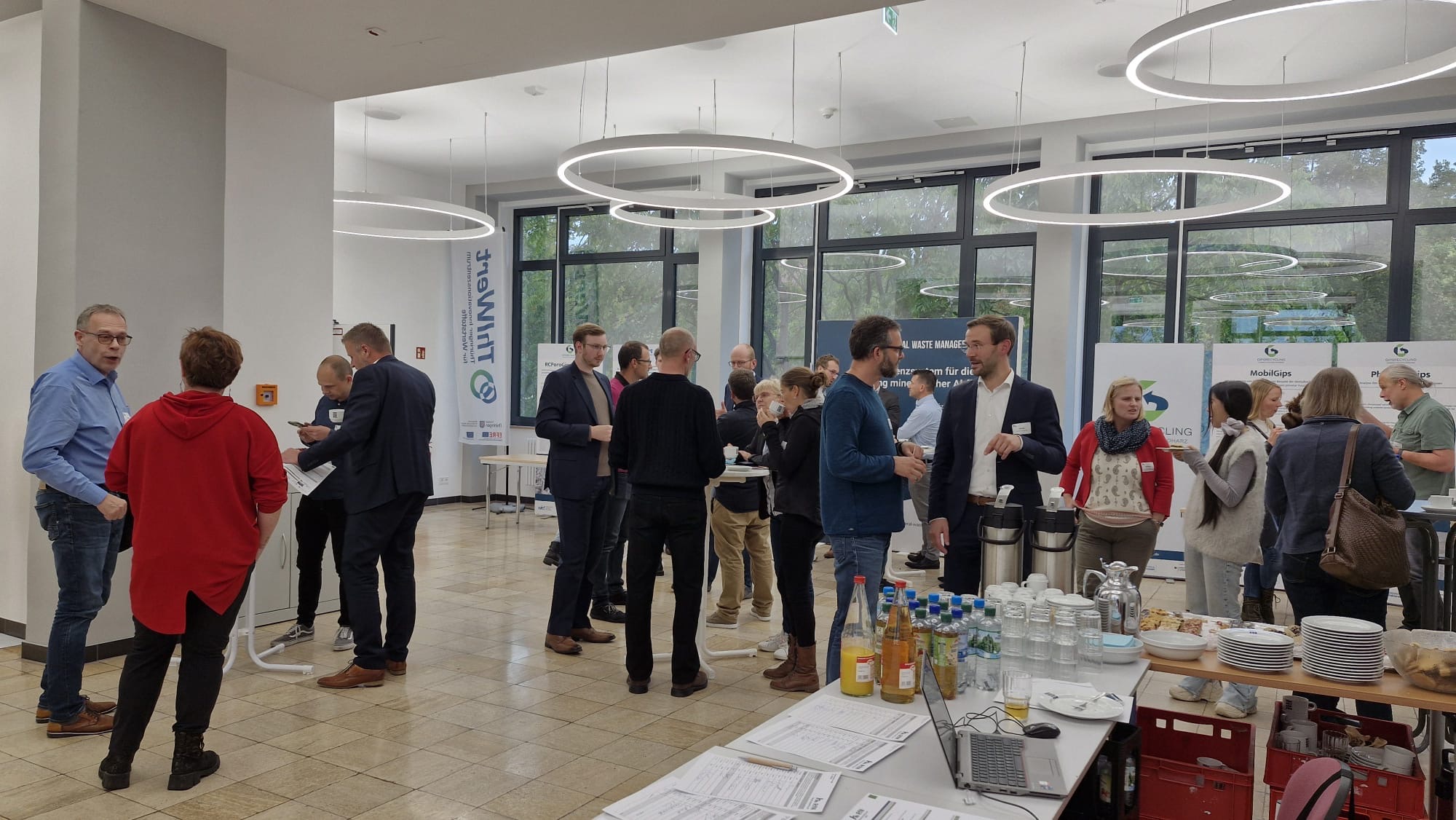 People in a modern event room.