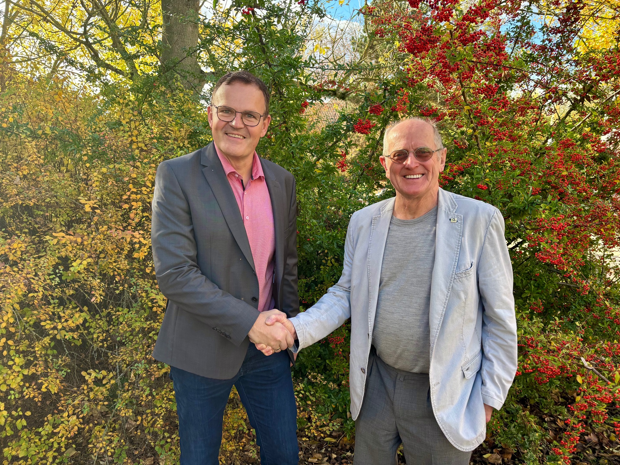 2 men with handshake